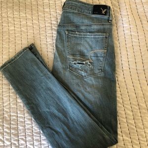 Distressed denim jeans